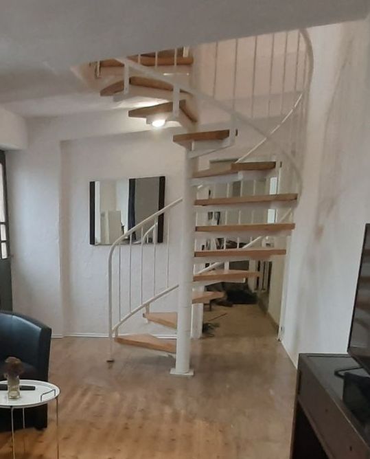 Wendeltreppe in der Ferienwohnung Remise im Seitentrakt in Rodershausen