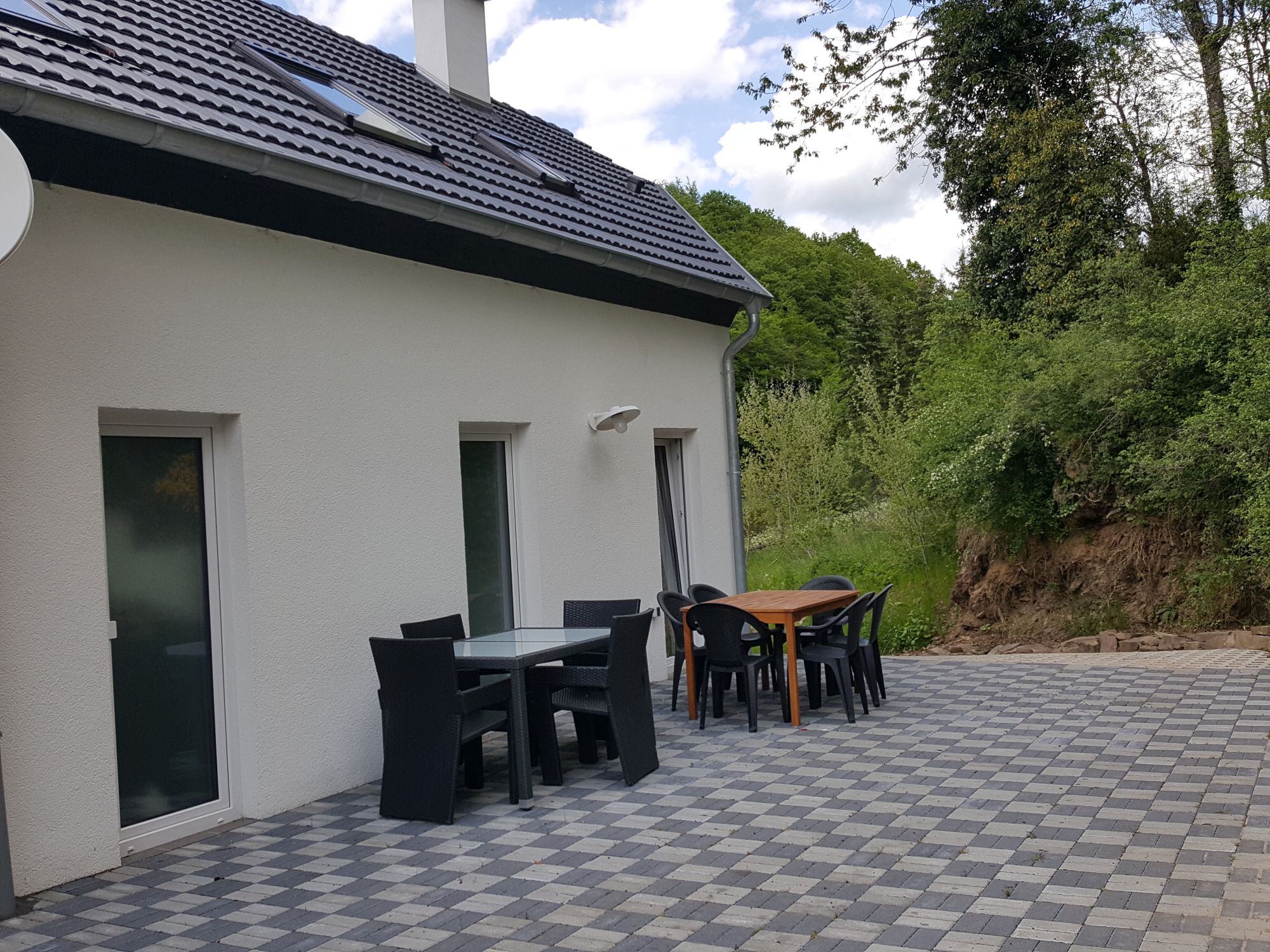 Terrasse hinter dem Ferienhaus Atrium - Außenbereich