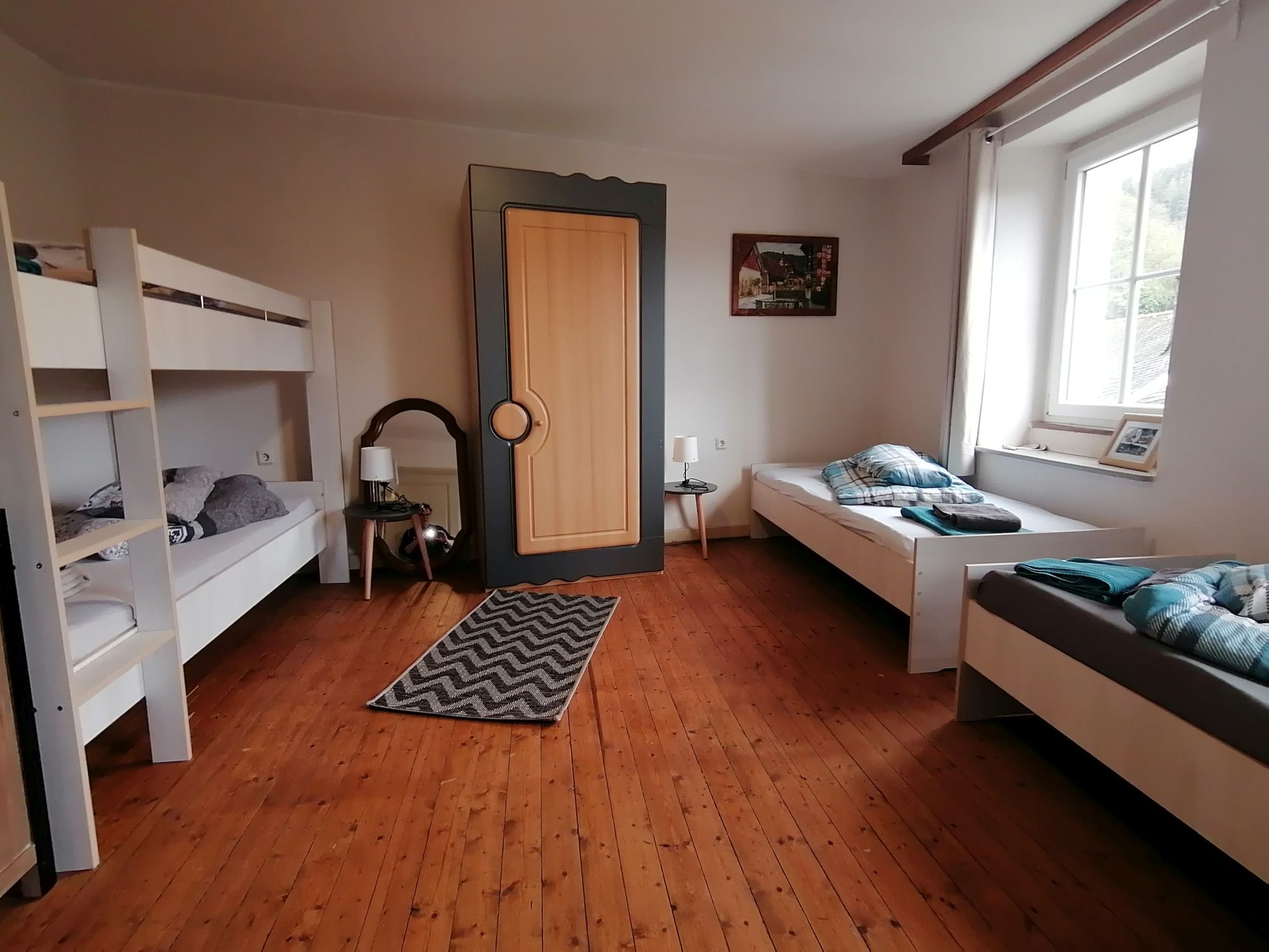 Schlafzimmer Schwarbildchen - Ferienwohnung Beilsturm in Neuerburg - Eifel